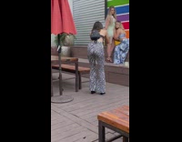 Two women dress outfit face on stomach rainbow