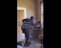 Guy greets stuffed animals like fans visor 