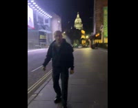 Woman interviews random man on street 