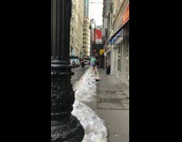 Inflatable trash can costume pretends to cry