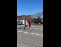 Two guys fight during rush hour traffic