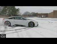 Girl does donuts with white car snow 