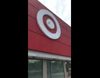 Guy throws plunger at target bullseye logo 