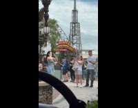 Collab IITW - Woman in tube top denim pants poses while her mother takes picture at the park