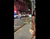 Man plays fake golf with milk cartons