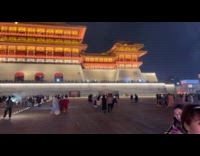 Woman with sparklers in front of palace