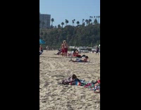 Shirtless guy red shorts runs towards pt. 2 