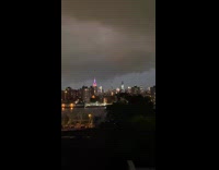 Lightning thunder rain storm city skyline river