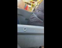 Green beetle bug on black shirt girl 