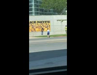 Guy poses sidewalk yellow lakers basketball poster 