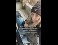 Girl puts leg through backpack strap to prevent theft