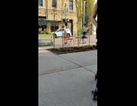 Girl in school uniform pose on street