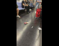 Open pregnancy test left on subway floor