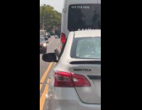Car driver feet on window and litters