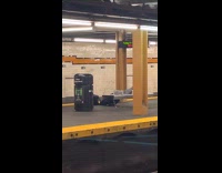 Man decline push ups on subway bench