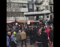Performers dance on stage black lives matter