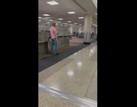 Man in pink shirt argues while on livestream