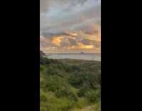 Sunset view from hill on the horizon