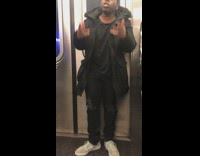 Collab WINY - man all black outfit yelling in train