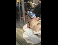 Man watches the Victoria Secret Fashion show on his cell phone on the subway #BluePointWhatTheL