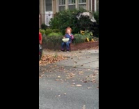 Chucky sits on the yard during Halloween