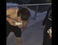 guy shotguns beers dives off bridge into water