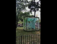 CGI glass box green blue balls park