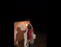 Guy puts firewood into container blows up