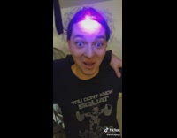 Guy checking his friends using blue UV light