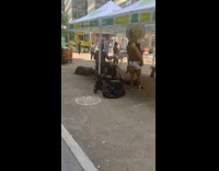 Collab WINY - Man use legs to play slide of trombone