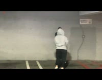 Man shouts to two women on the garage