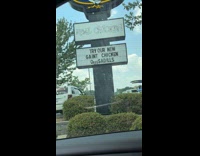 Submitter reading typos and misspellings on pylon sign