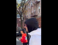 Guy holds free cigs sign during marathon