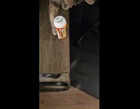 Cat push prescription bottle off the table