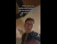 Guy glasses pretends to punch phone 