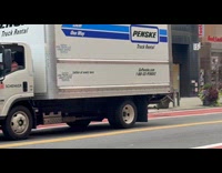 Gold man on the move through city