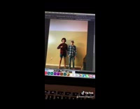 Collab BSMedia - Guy hangs up photo at cracker barrel