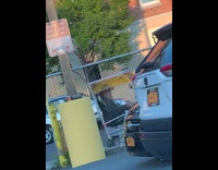 Old man drives scooter with canopy 