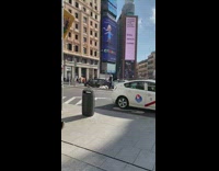 Guy lays down on ground to take photo