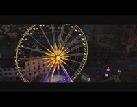 Collab DailyDoseOfInternet - Aerial drone view of Ferris wheel with lights