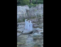 Three nuns sing clap rock river water 