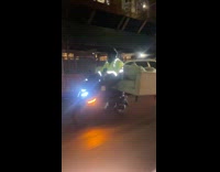 Man drive motorcycle carry sit on sofa