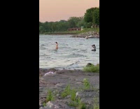Girl bikini walk in water beach photographer