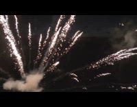Reverse video of fireworks explosions drone shot