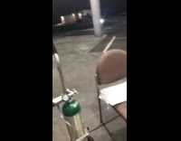 Girl tie dye hoodie in parking lot on air