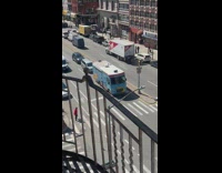 Collab WINY - Man red jacket Dances to Jewish Truck Tune on Street crosswalk