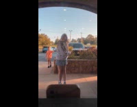 Collab IITW - Girl glasses hoodie jump spin restaurant window