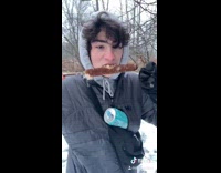 Collab BitchIG2 - Guy outside takes bite of cat tail plant mouth full of cotton