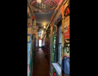Hotel hallway and rooms painted by artists