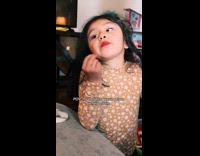 Young girl use skittle food coloring as blush